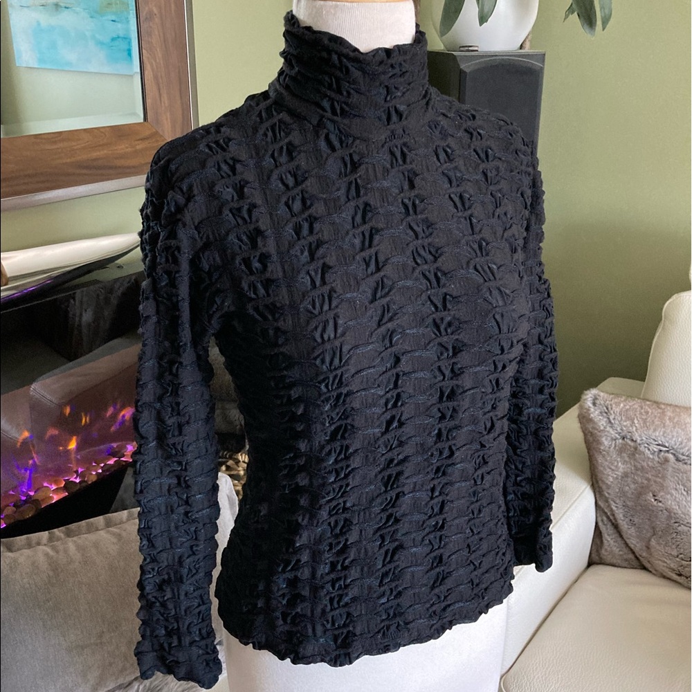 Textured turtleneck like sweater